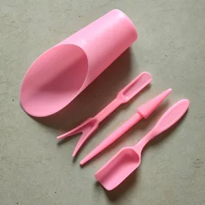 Pink succulent gardening tools detail view, plastic 4-piece set for plants transplanting.