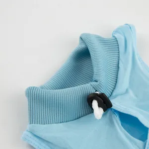 Cat recovery suit detail view, post-surgery wear collar and adjustable drawstring close-up.