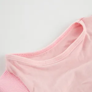 Close-up detail of soft pink pet recovery suit collar and ribbed sleeve design for cat comfort.