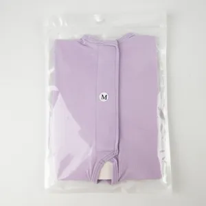 Purple cat recovery suit, breathable post-surgery wear for kittens in clear packaging.