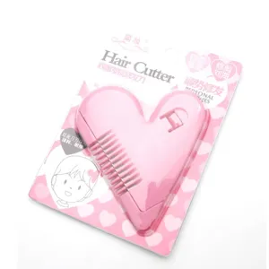 Pink heart-shaped hair cutter comb for bangs trimming, dual-sided blade thinning.
