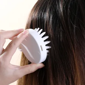 Spazzola elettrica per massaggio del cuoio capelluto in silicone per la doccia.