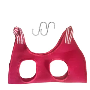 Pet grooming hammock detail view, breathable red mesh fabric with metal S-hooks for pets.