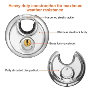 Stainless steel disc padlock detail, hardened shackle, brass cylinder and solid body.