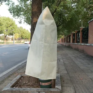 Winter plant frost protection cover non-woven fabric cold-proof plant bag for outdoor garden use.