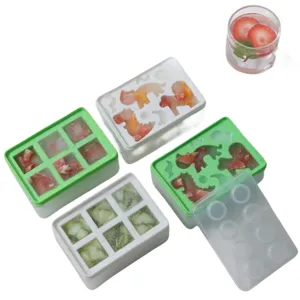 Détails du bac à glaçons en silicone avec formes de dinosaures mignons et fruits à l'intérieur.