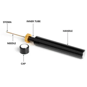 Detailed view of the black and gold needle-type air pressure wine bottle opener with cap.