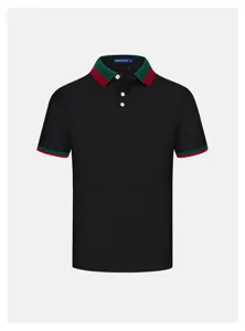 Detail view of men's black polo shirt featuring green and red striped collar and cuffs.
