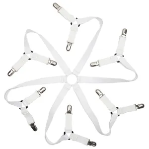 Detail view of the white 6-way elastic bed sheet fastener with metal clips for secure hold.