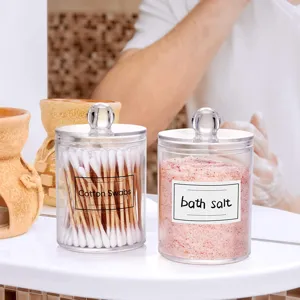 Clear acrylic storage jar with lid, perfect for cotton swabs and bath salt organization.