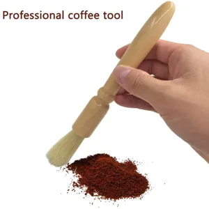 Wooden coffee brush with fine bristles for cleaning espresso grinders and coffee machines easily.