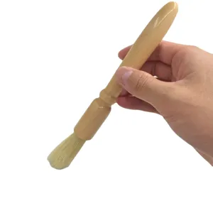 Wooden handle coffee cleaning brush, ideal for espresso grinders and coffee machines main view.