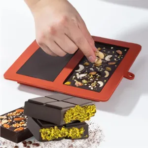 Silicone chocolate mold detail showing pistachio filling process and finished Dubai chocolate bars.