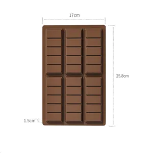 Chocolate mold detail view, flexible silicone material showing dimensions and grid layout.