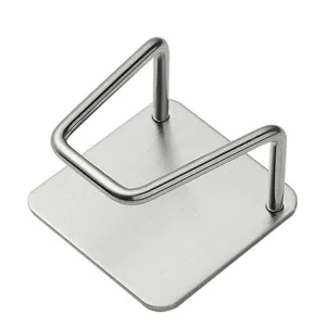 Stainless steel sponge holder detail close-up, kitchen sink drain rack metal structure accessory.