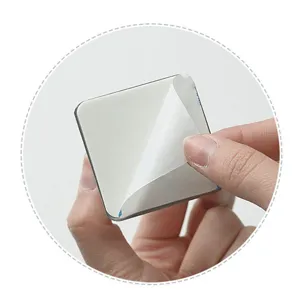 Stainless steel sponge holder adhesive backing detail, punch-free kitchen sink storage accessory.