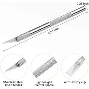 Stainless steel craft knife detail view, showing 11 blade, handle texture and safety cup.