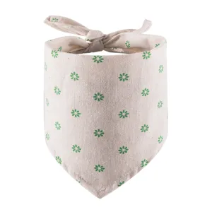 Detailed view of the cute pet bandana featuring green daisy print, cotton linen fabric.