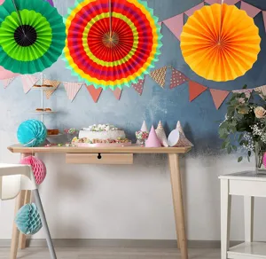 Detailed view of colorful paper fan flower sets for Mexican party and wedding decoration.