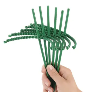Green plastic plant support stakes, adjustable flower holder for potted plants and orchids.