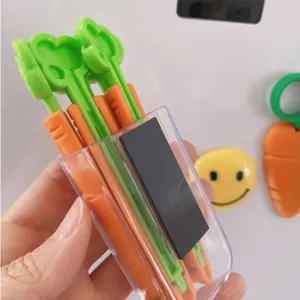 Wortelvormige voedselafdichtingsclips 5-stuks set met handige magnetische opbergdoos.