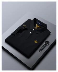 Classic black men's short-sleeve polo shirt with lapel collar, premium embroidered logo detail.