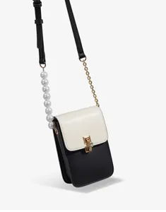 Borsa a tracolla nera e bianca con catena di perle, elegante borsa da donna alla moda e chic.