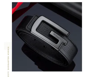 Detailed view of the premium black leather men's belt featuring a sleek metallic buckle design.