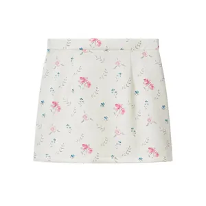 Floral print mini skirt for women, chic watercolor flower short skirt, elegant resort style apparel.