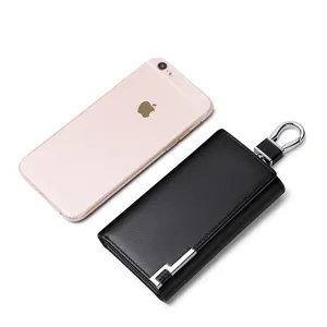 Estuche de llaves de cuero genuino para hombre con gancho metálico, organizador negro.