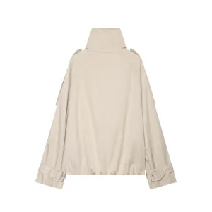 Back detail of women short beige stand collar windbreaker jacket with adjustable cuff straps.