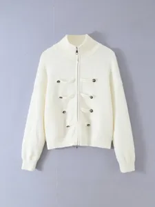 Chic white knit cardigan sweater with mock neck, front zipper and decorative metal buttons.