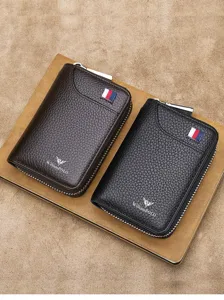 Estuche de cuero genuino para llaves con cremallera y diseño compacto, ideal para tarjetas y llaves.