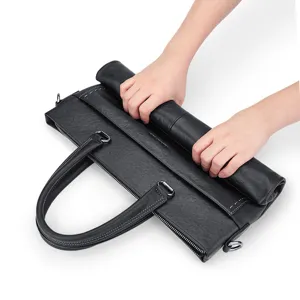 Borsa da lavoro aziendale in vera pelle nera, design morbido e pieghevole con manici.