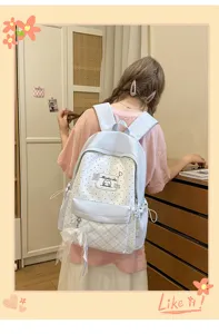 Cute polka dot canvas backpack for women, stylish daily school bag with gentle design.