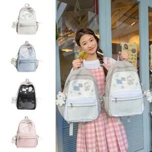 Sac à dos d'étudiant mignon avec couleur contrastée, grande capacité et patch astronaute adorable.