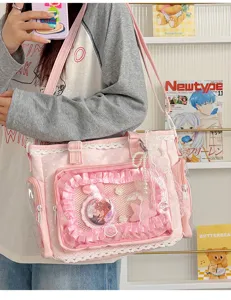 Pink anime ita bag large capacity canvas shoulder bag with clear display window and lace trim.