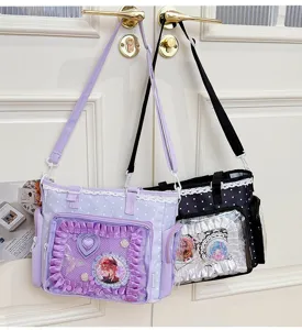Kawaii ITA shoulder bag with clear PVC window, polka dot ruffle design, and anime badge display.