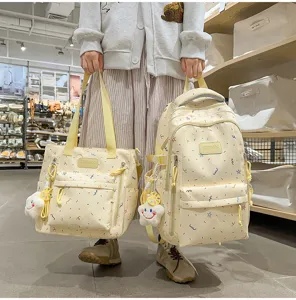 Japanese style casual canvas backpack and tote bag set with cute star print for students.
