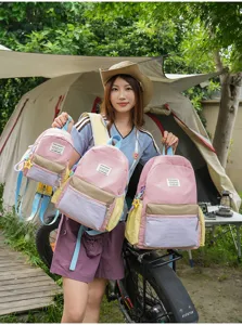 Casual style color-blocked school backpack for women, lightweight outdoor daypack.