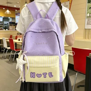 Zaino scolare viola con stampa di stelle per ragazze zainetto casual con tasca frontale