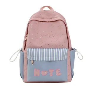 Zaino scolastico carino rosa e blu per ragazze adolescenti con stelle e tasca frontale.