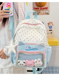 Cute polka dot ita backpack with cat ears, transparent window and plush charms for students.