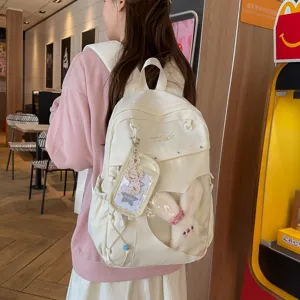 Casual large capacity canvas backpack with transparent window and cute plush rabbit pendant.