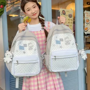 Joli sac à dos en toile à pois pour femmes, cartable de loisir mignon avec pendentifs en peluche