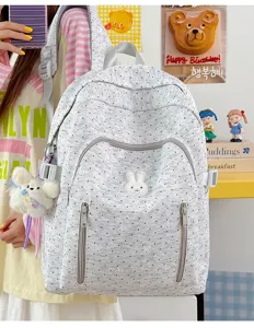 Cute polka dot cartoon school backpack for teen girls, large capacity casual daily daypack.