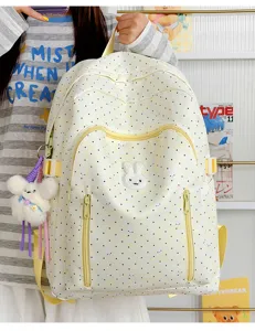 Cute polka dot canvas backpack for teenage girls with cute rabbit patch and sweet school bag style.
