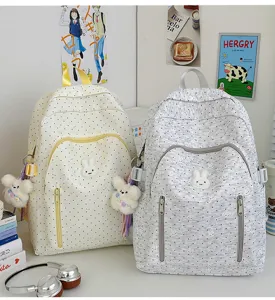Cute polka dot cartoon school backpack for teen girls, large capacity casual daypack daily use.