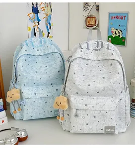 Casual star print school backpack with cute cloud pendant, versatile casual daily book bag for girls.
