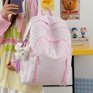 Cute pink polka dot school backpack with adorable bunny pattern, large capacity for daily use.